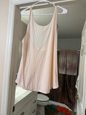 Woman’s size 10 Lululemon light Pink Lightweight Tank Top